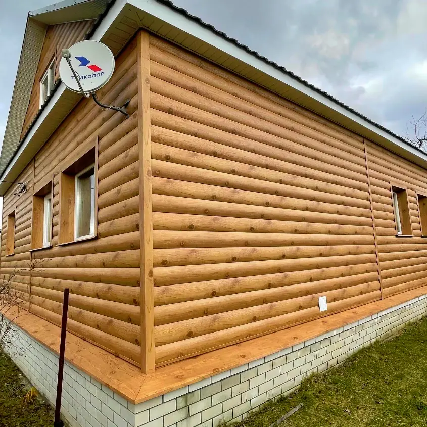 Фото 3 металлосайдинг Блок-Хаус под бревно Клен Светлый 3D на фасаде
